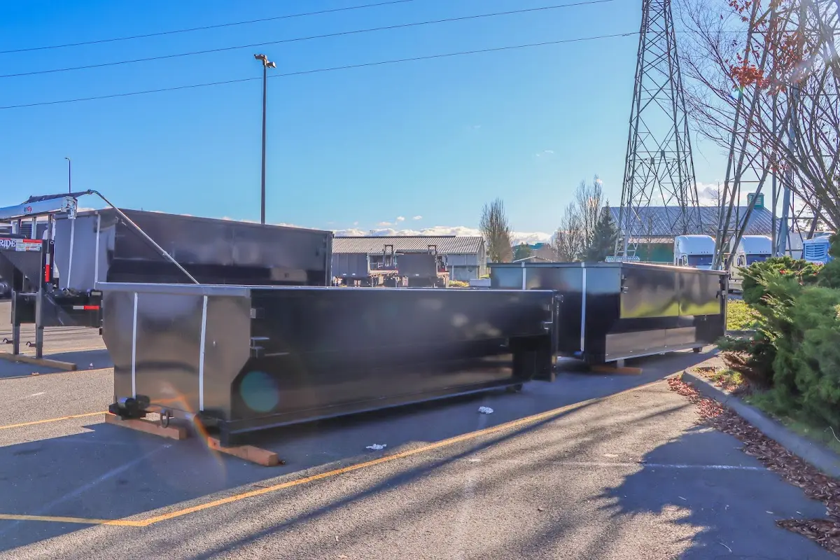 Roll-off dumpster ready for waste disposal at job site for 2 Yard Dumpster Rental in Bristol
